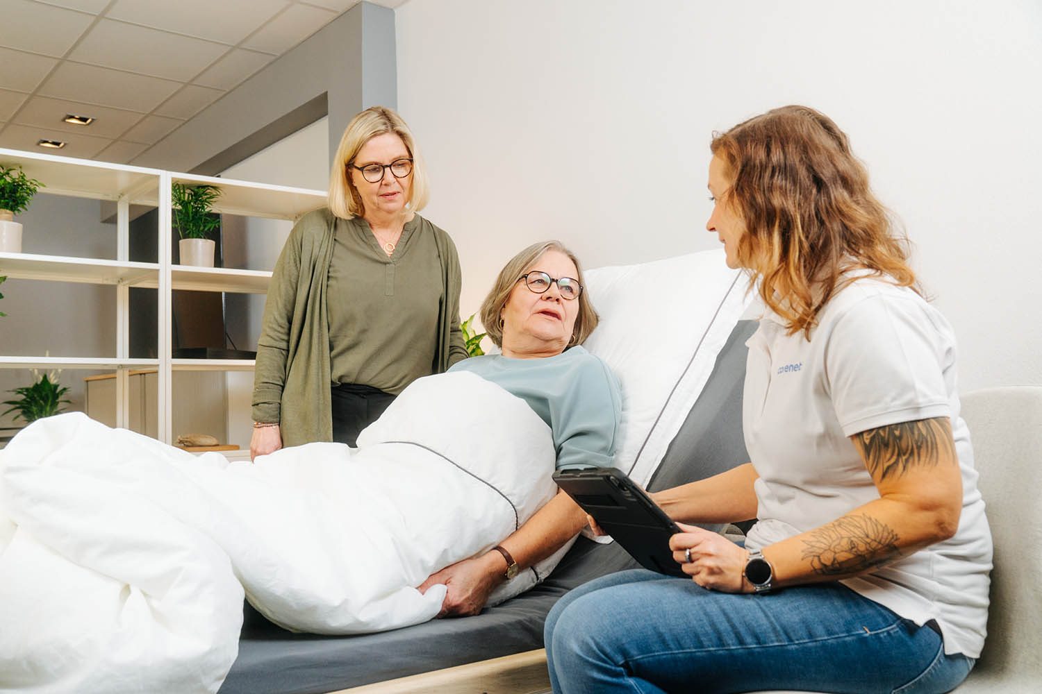 A pressure ulcer patient receiving advice from Carenetic specialist staff.